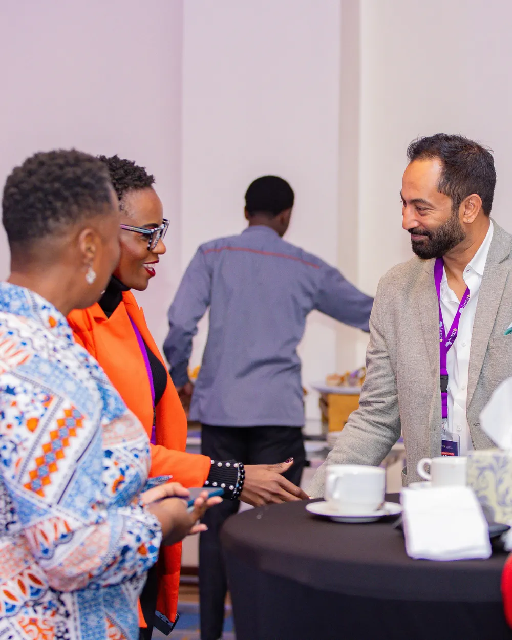 Members of the community in conversation at the Summit